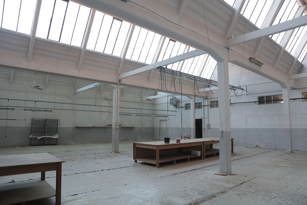 Vacant white-box shopping center unit before build-out